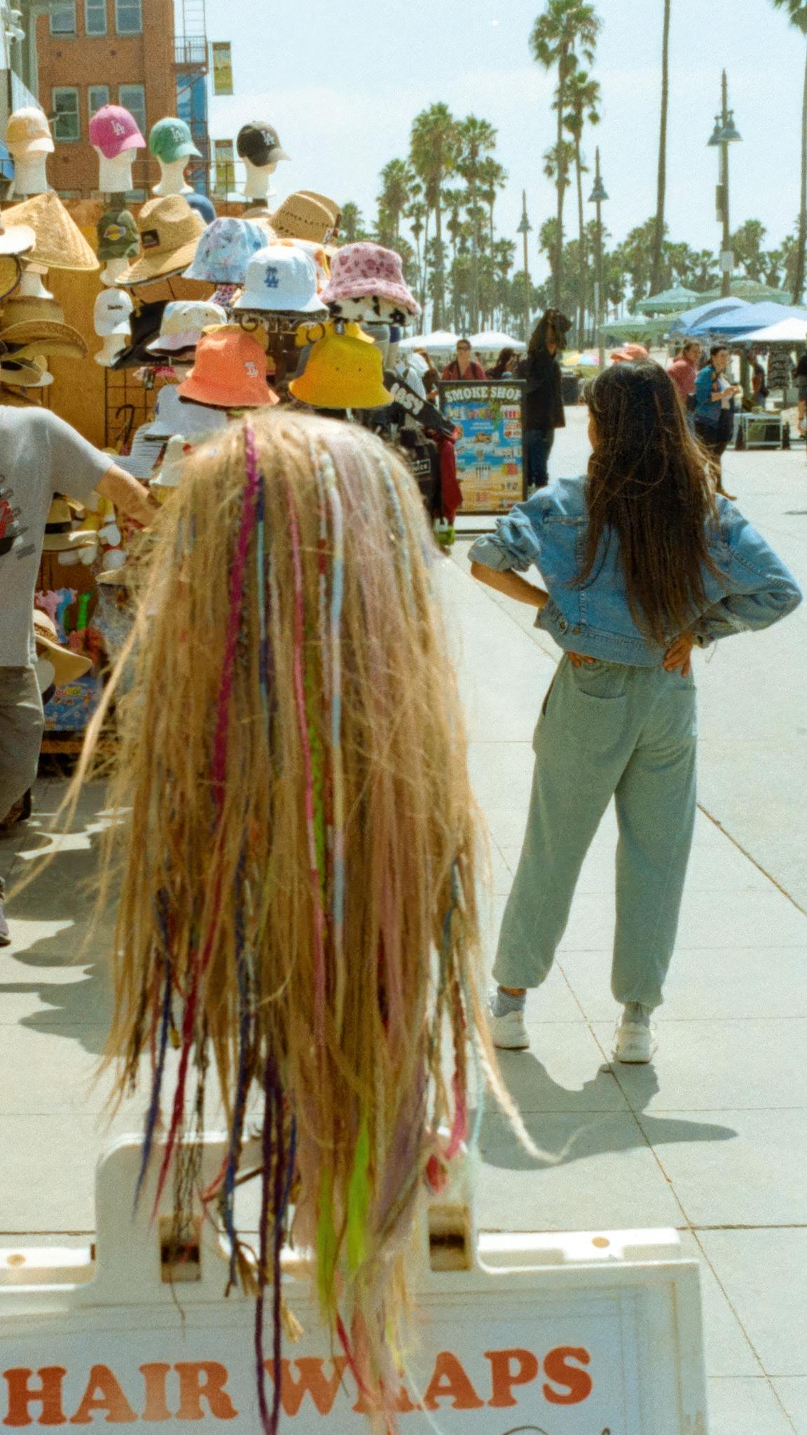 vibrant hair wraps and hats on display
